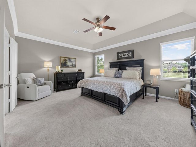 79 W Wading Pond Circle, The Woodlands, TX 77375