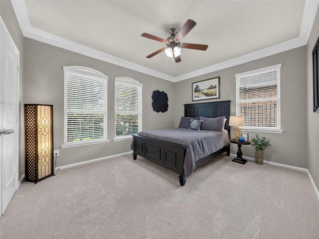 79 W Wading Pond Circle, The Woodlands, TX 77375