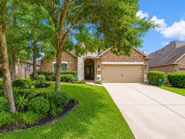 79 W Wading Pond Circle, The Woodlands, TX 77375