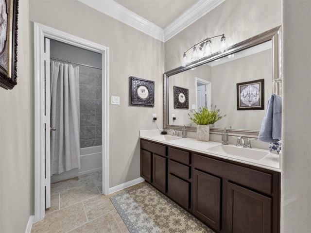 79 W Wading Pond Circle, The Woodlands, TX 77375