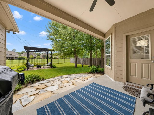 79 W Wading Pond Circle, The Woodlands, TX 77375