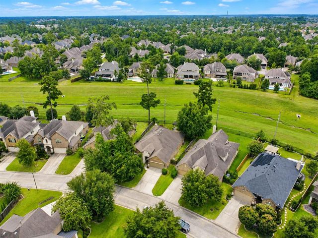 79 W Wading Pond Circle, The Woodlands, TX 77375