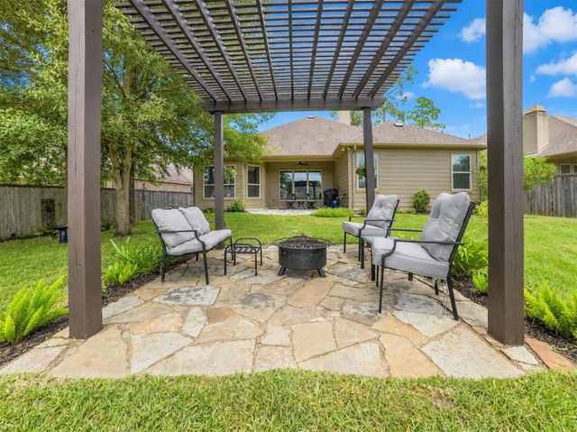 79 W Wading Pond Circle, The Woodlands, TX 77375