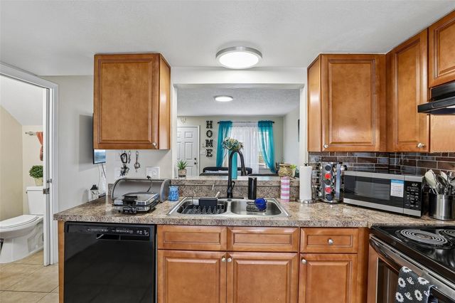 12057 TIFT CIRCLE, Orlando, FL 32826