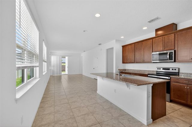 4406 DAVOS DRIVE, Clermont, FL 34711