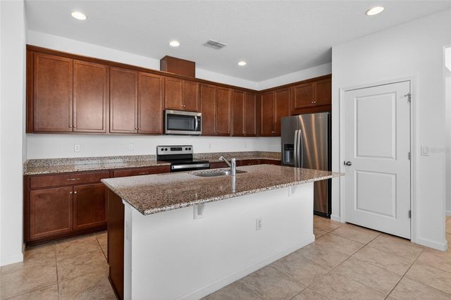 4406 DAVOS DRIVE, Clermont, FL 34711