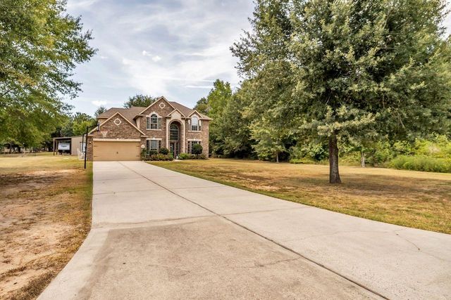9061 Water Buck Lane, Conroe, TX 77303