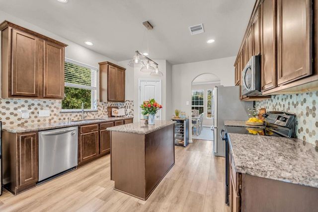 9061 Water Buck Lane, Conroe, TX 77303