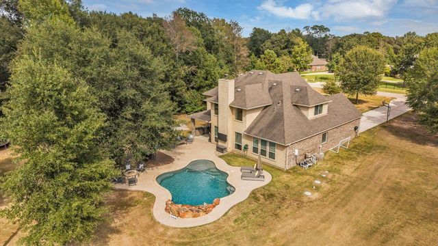 9061 Water Buck Lane, Conroe, TX 77303