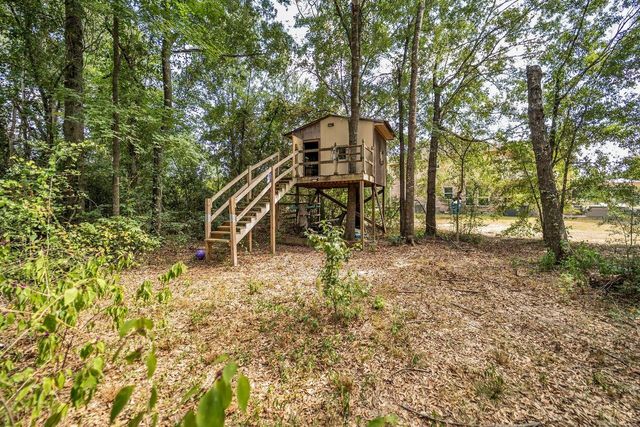9061 Water Buck Lane, Conroe, TX 77303