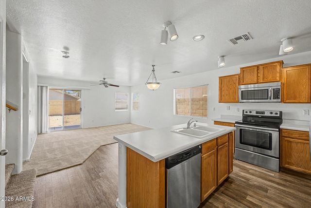 11577 W PURDUE Avenue, Youngtown, AZ 85363