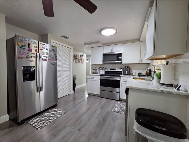 4834 GASLIGHT AVENUE, Holiday, FL 34690