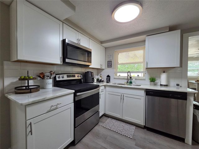 4834 GASLIGHT AVENUE, Holiday, FL 34690