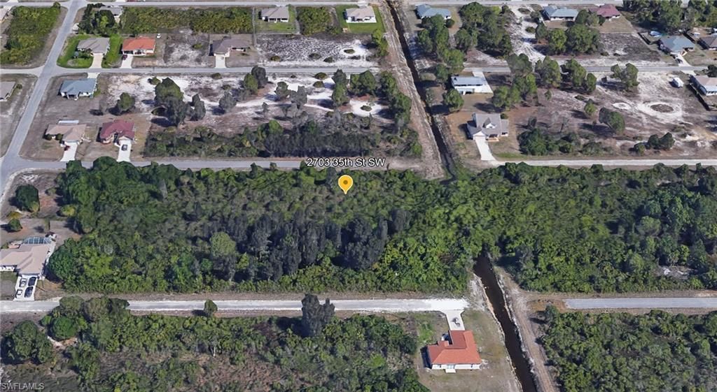 2703 35th ST SW, LEHIGH ACRES, FL 33976 — photo 2