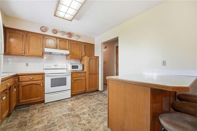 505 Blue Grass Drive, Raymore, MO 64083
