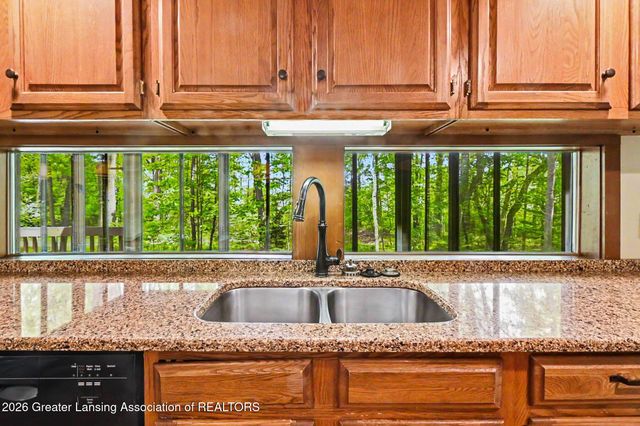 1135 Woodwind Trail, Haslett, MI 48840