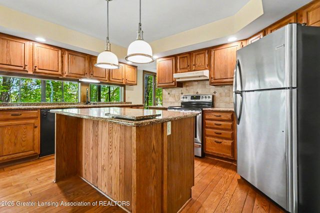 1135 Woodwind Trail, Haslett, MI 48840