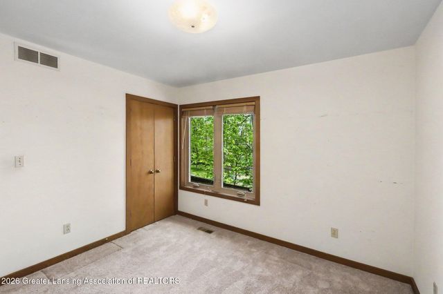 1135 Woodwind Trail, Haslett, MI 48840