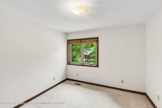 1135 Woodwind Trail, Haslett, MI 48840