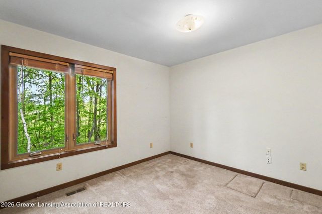 1135 Woodwind Trail, Haslett, MI 48840