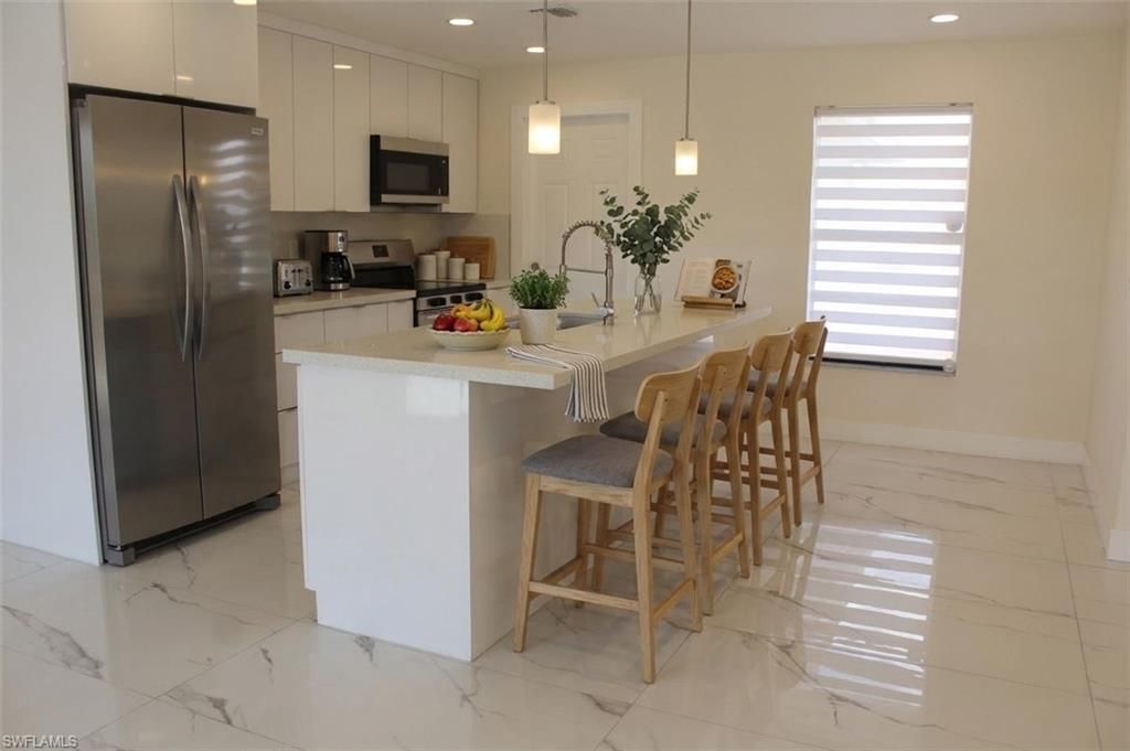 Image 5 of property listing at 3312 SW 7th AVE, Cape Coral, FL 33914