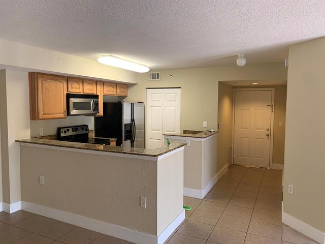 241 SW Palm Drive 107, Port Saint Lucie, FL 34986