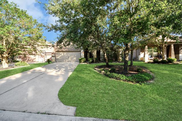 143 W Wading Pond Circle, Tomball, TX 77375