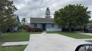 9221 W Highland Pines Drive, Palm Beach Gardens, FL 33418