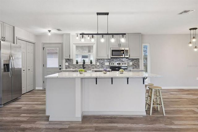 12150 VIRGINIA DRIVE, Leesburg, FL 34788