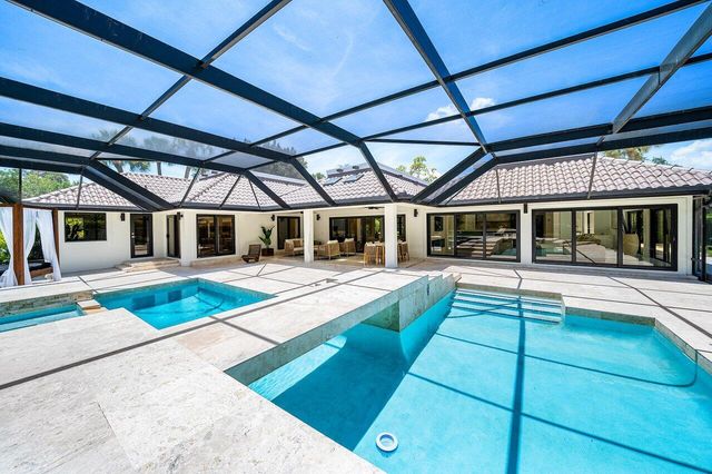 1648 Breakers West Boulevard, West Palm Beach, FL 33411