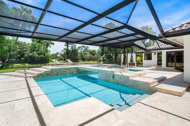 1648 Breakers West Boulevard, West Palm Beach, FL 33411