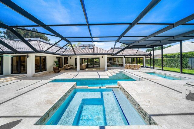 1648 Breakers West Boulevard, West Palm Beach, FL 33411
