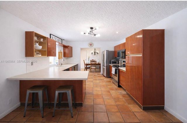 7355 Poinciana Court, Miami Lakes, FL 33014