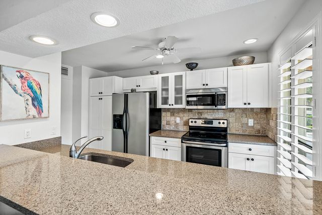 523 BRACKENWOOD Place, Palm Beach Gardens, FL 33418