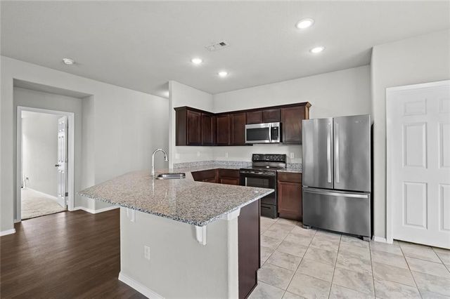 313 Woodcreek Street, Lowell, AR 72745