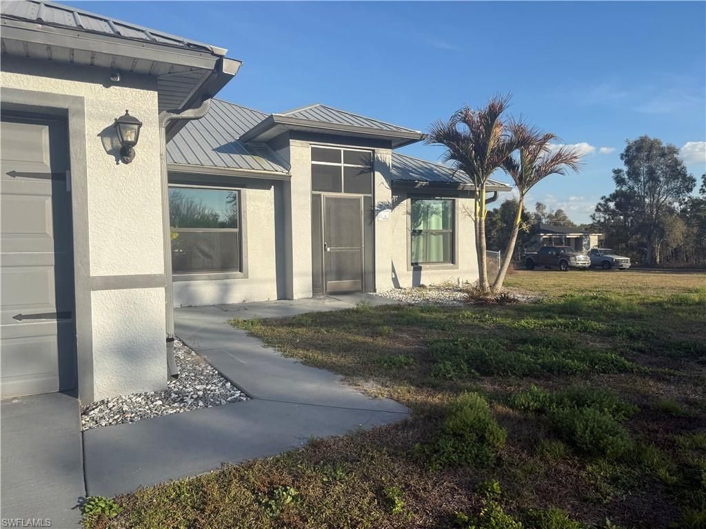 717 Fleming AVE S, LEHIGH ACRES, FL 33974 — photo 3