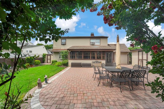 77 Pilgrim Lane, Westbury, NY 11590