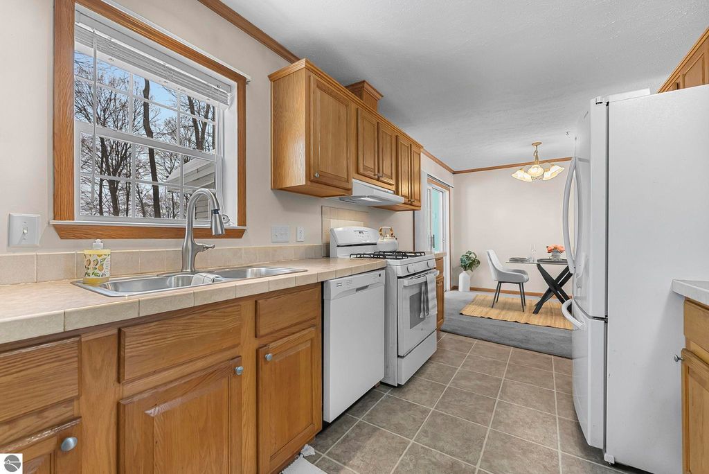 Image 11 of property listing at 4046 White Birch Drive, Grawn, MI 49637