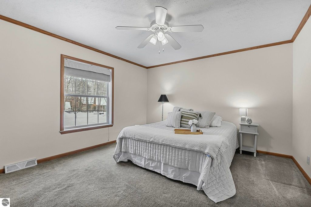 Image 20 of property listing at 4046 White Birch Drive, Grawn, MI 49637