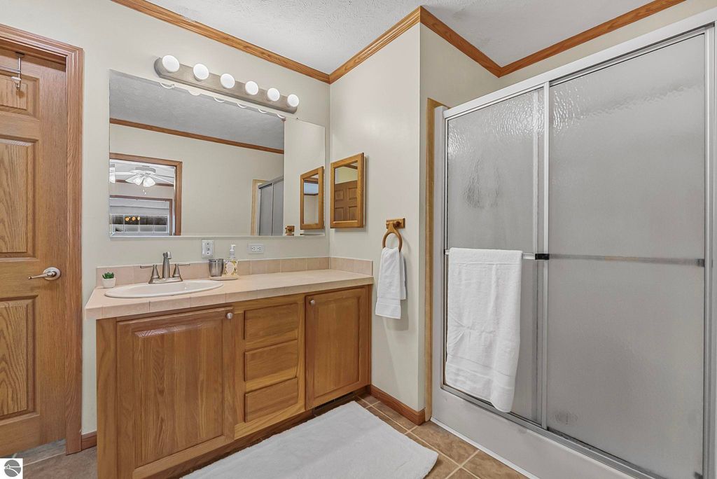 Image 24 of property listing at 4046 White Birch Drive, Grawn, MI 49637