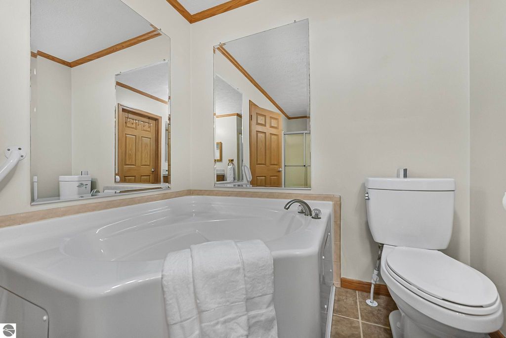 Image 25 of property listing at 4046 White Birch Drive, Grawn, MI 49637
