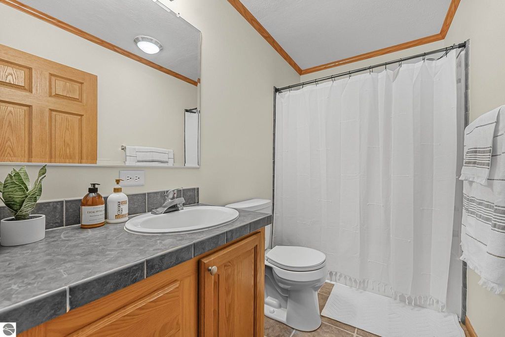 Image 26 of property listing at 4046 White Birch Drive, Grawn, MI 49637