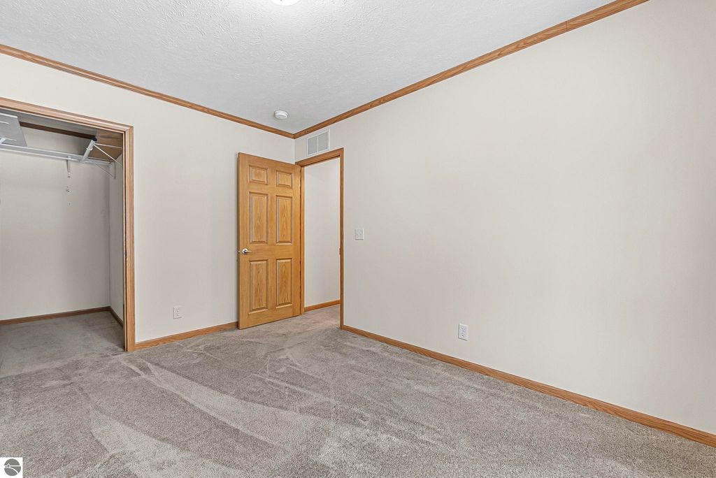 Image 28 of property listing at 4046 White Birch Drive, Grawn, MI 49637