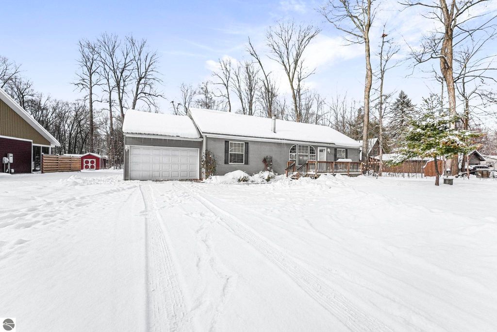 Image 50 of property listing at 4046 White Birch Drive, Grawn, MI 49637
