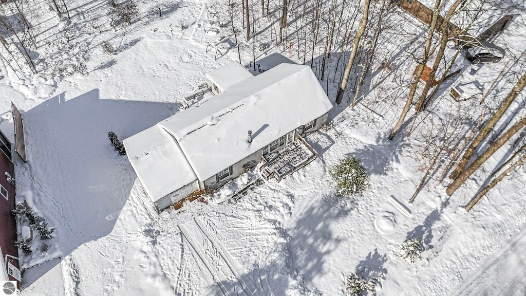 Image 51 of property listing at 4046 White Birch Drive, Grawn, MI 49637