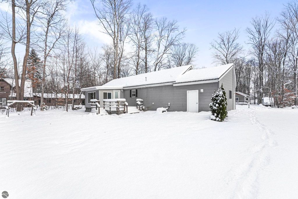 Image 54 of property listing at 4046 White Birch Drive, Grawn, MI 49637