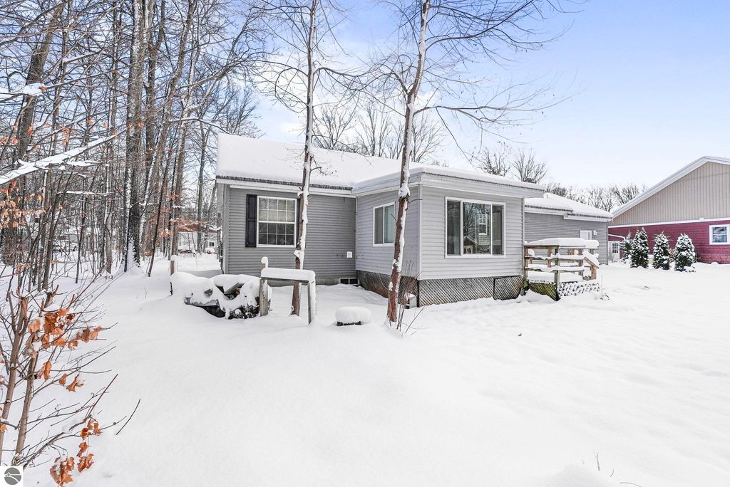 Image 55 of property listing at 4046 White Birch Drive, Grawn, MI 49637