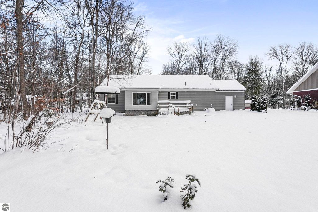 Image 56 of property listing at 4046 White Birch Drive, Grawn, MI 49637