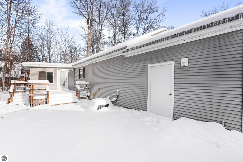 Image 58 of property listing at 4046 White Birch Drive, Grawn, MI 49637