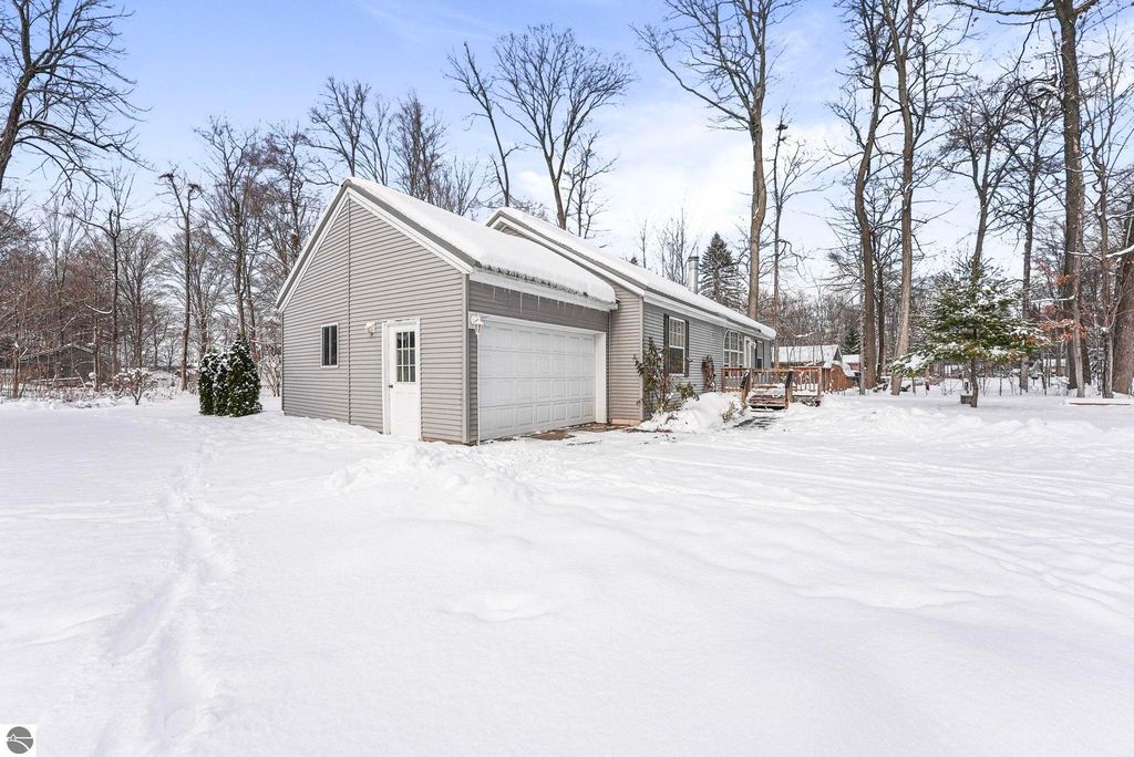Image 59 of property listing at 4046 White Birch Drive, Grawn, MI 49637